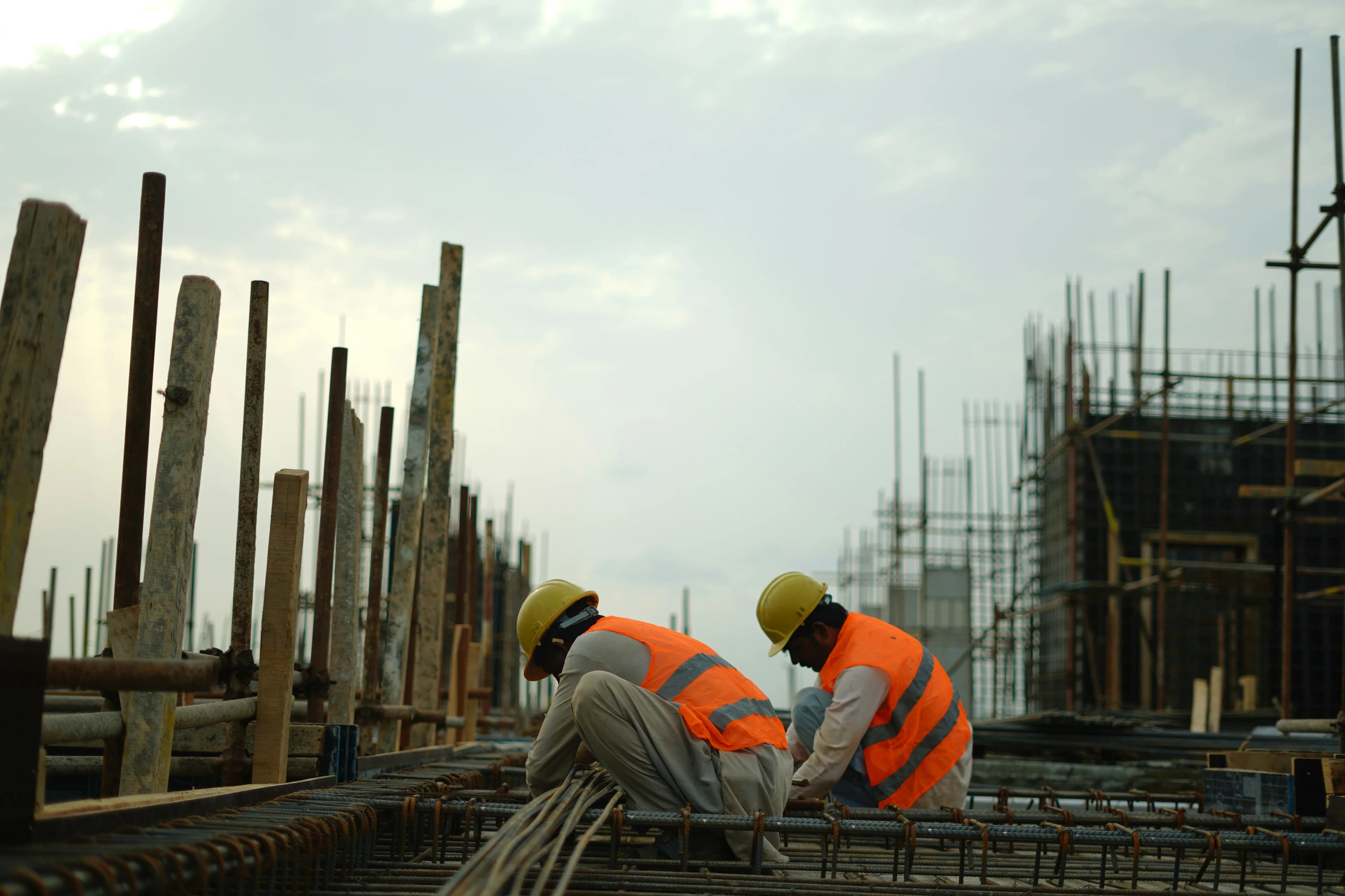 Wide view of cranes over a live construction site